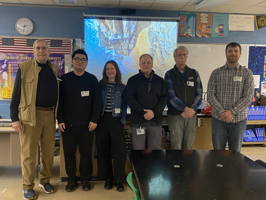 A group of archaeologists and computer scientists went to Alpena High School in Alpena, Michigan to demonstrate the virtual land bridge to students. From left to right: Bob Reynolds, Chencheng Zhang, Ashley Lemke, Erich Schulter, a high school teacher in Alpena, John O'Shea and Cailen O'Shea. (courtesy: John O’Shea, University of Michigan)