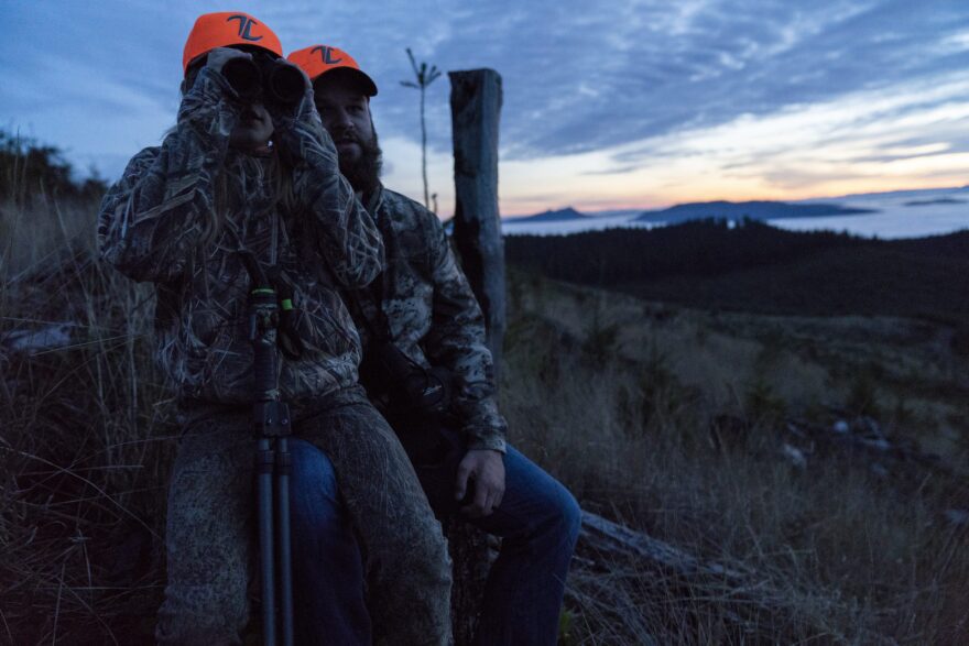 Taylor Tiller, 10, sits with her her father, Tyler. Hunting trips are a family tradition and a way for Taylor to learn about responsibility, the environment and self-confidence.