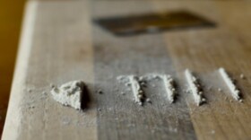 lines of cocaine with credit card in background