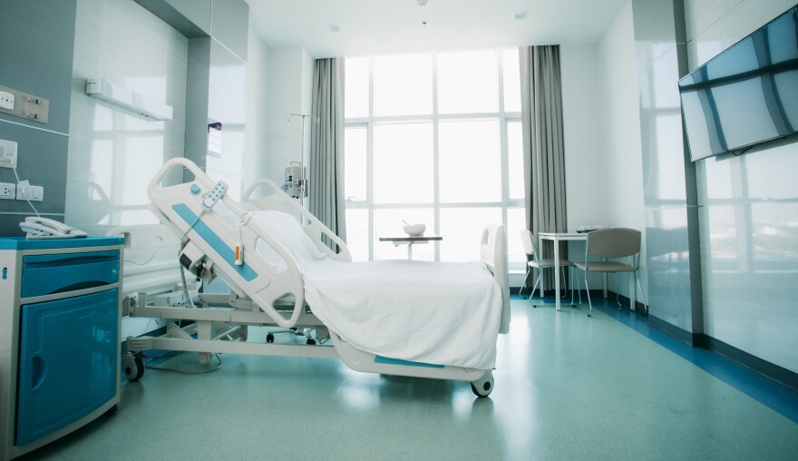 Recovery Room with beds and comfortable medical. Interior of an empty hospital room. Clean and empty room with a bed in the new medical center