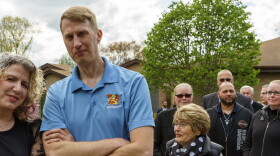 Craig Makowski waits in line to pay his respects to Stew Leonard Sr. Makowski has worked for the company since 1987 and currently works at the Newington location.