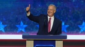 Michael Whatley, North Carolina senatorial candidate, greets delegates as he takes the stage at the Republican convention in Dallas, Wednesday, Sept. 9, 2026. 