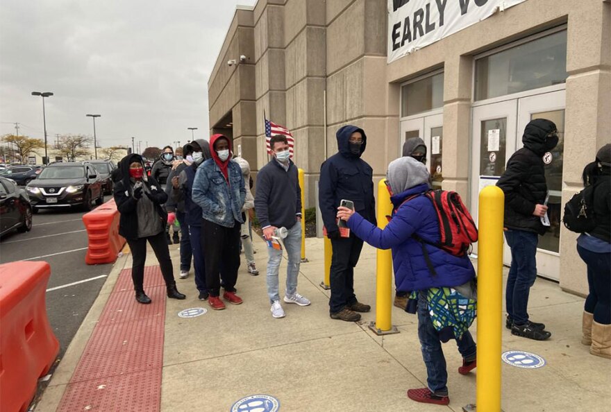 Voters waiting more than two hours to cast a ballot during the final weekend of early voting in Ohio on Sunday, November 1, 2020 at the Franklin County Board of Elections in Columbus. 