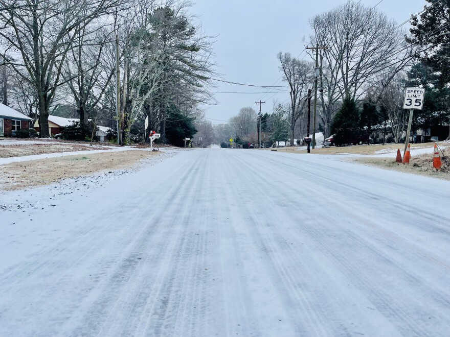Sleet and snow covers a road in Matthews, N.C., on Jan. 25, 2026.