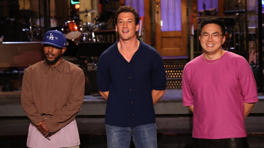 Musical guest Kendrick Lamar, host Miles Teller, and Bowen Yang recording a promo for Saturday Night Live's 48th season opening episode.