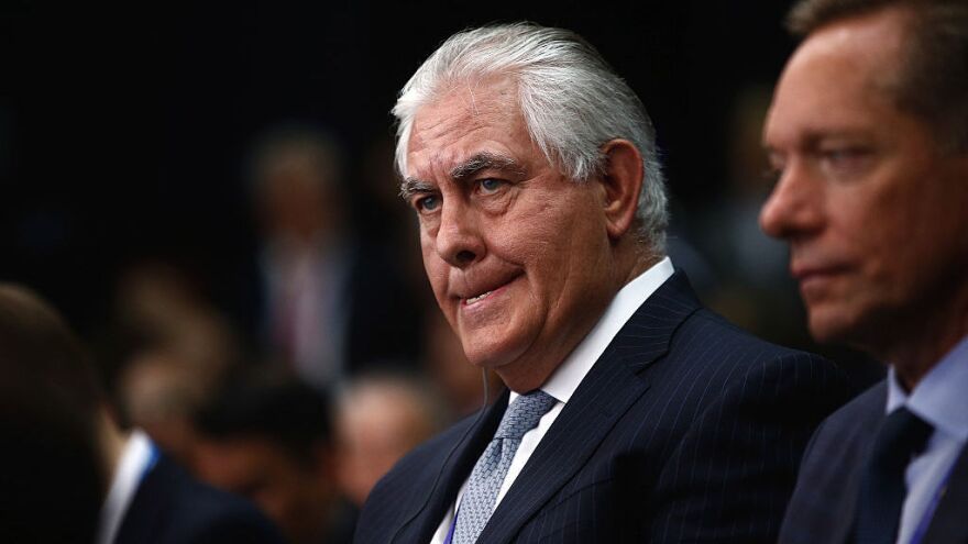 rex-tillerson-chief-executive-officer-of-exxon-mobile-corp-left-listens-on-the-opening-day-of-the-st-petersburg-international-economic-forum-this-past-june