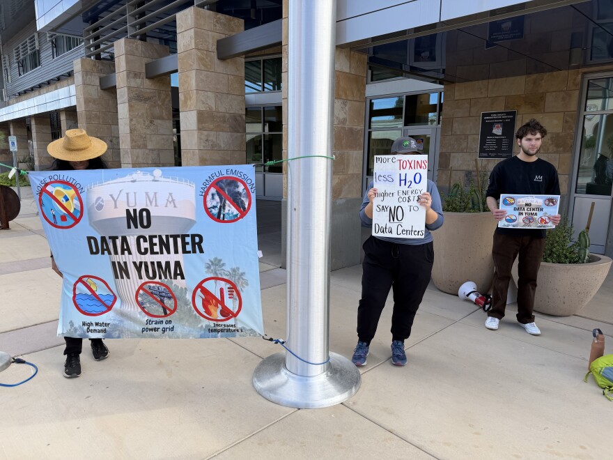 Yuma County residents protest data centers outside a meeting of the Greater Yuma Economic Development Corp. on Friday, April 10, 2026. The majority of protesters went inside the meeting as it was opened to the general public.