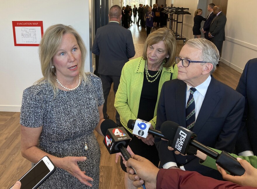 Christy Pambianchi, left, Intel's Executive Vice President and Chief People Officer , outlines details of a $150 million educational investment in developing a workforce in semiconductor research and design, as Ohio First Lady Fran DeWine and Gov. Mike DeWine listen, on Thursday, March 17, 2022, in Columbus, Ohio. Pambianchi said the investment's goal is to catapult the U.S. back to a leading role in the semiconductor industry.