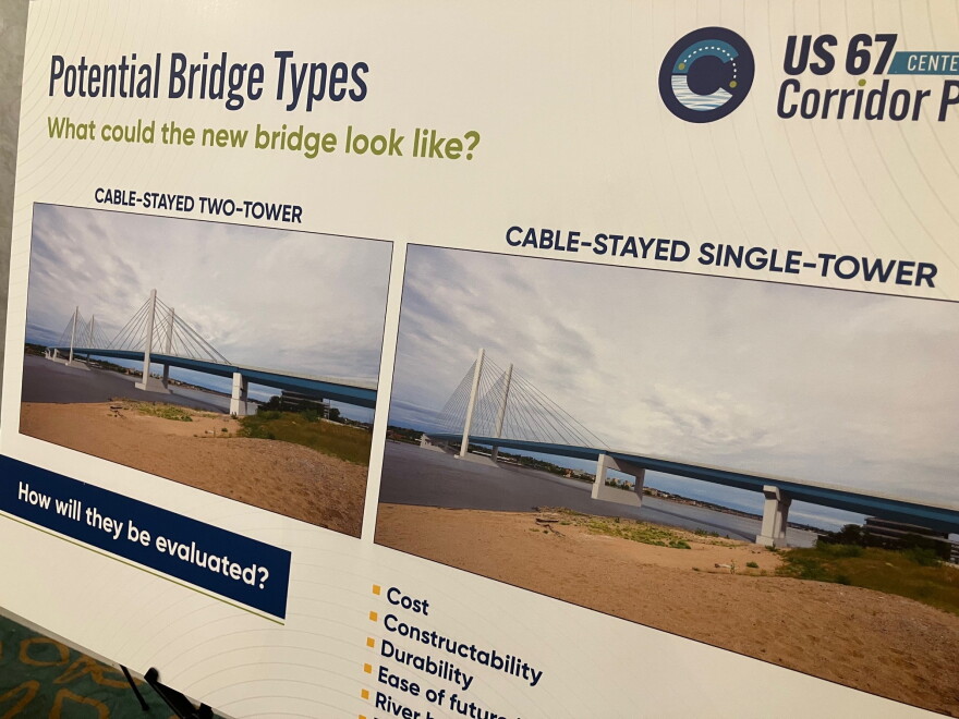 Two of the potential bridge designs for a new Centennial Bridge at an open house Wednesday, Oct. 21, 2026. None were similar to the arched design the current bridge has.