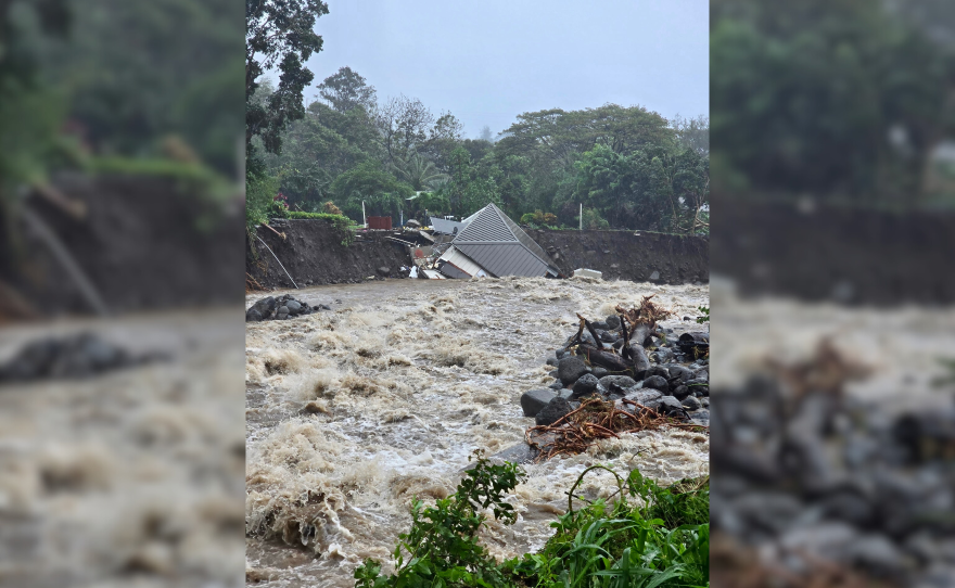 A photo provided by Maui County shows the ʻĪao Valley home of Carrie and Tom Bashaw, fallen into the stream. (March 15, 2026)