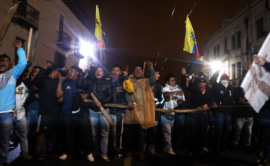 Protesters pack Santo Domingo Square in Quito on Monday night. After the Ecuadorian government scrapped subsidies last week as part of an agreement with the International Monetary Fund, fuel prices leaped more than 100 percent and prompted massive protests.