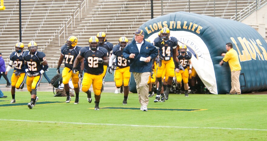 The A&M-Commerce Lions with head coach Guy Morriss.