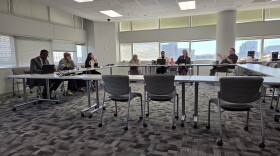 Members of the CMS superintendent search committee meet Tuesday.