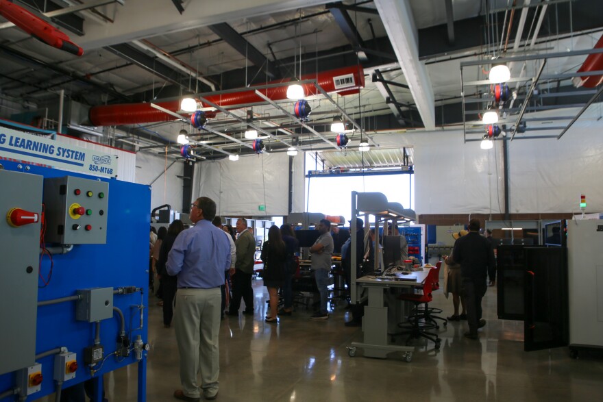 After the ribbon cutting, folks milled about the Workforce Accelerator, checking out all the learning systems and technology that Wellton students will be using.