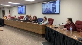 Bloomington City Manager, on screen, addresses the Bloomington City Council at its meeting Monday, Dec. 12, 2022, at the downtown Government Center.
