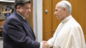 Illinois Gov. JB Pritzker shakes hands with Pope Leo XIV during an audience in the Vatican.
