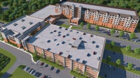 A rendering of the proposal for a two-phase 93,000-square-foot casino and restaurant at the Sheraton Nashua. The first phase of the project is the portion in front, including the five-story parking garage, with the existing building to the rear. The first phase is before the Planning Board June 4. (Courtesy Montgomery Roth Architects)