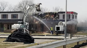 Crews tear down part of the West Calumet Housing Complex on April 2, 2018. Several residents were told the area would be turned into housing again after the lead and arsenic cleanup.