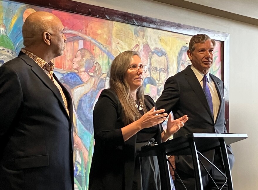 Figge Art Museum executive director Melissa Mohr talks about the painting donation, with Sampson and Heller, at Modern Woodmen Park March 26, 2026.