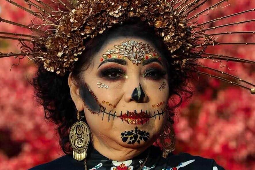 Leticia Seitz celebrates Día de Muertos in traditional clothes and makeup.