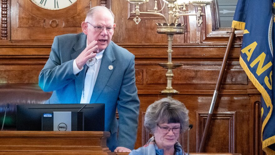 House Speaker Dan Hawkins, R-Wichita, speaks to a House colleague before convening the Kansas House on Monday Jan. 12, 2026. Hawkins is seeking the Republican nomination for state insurance commissioner, and that candidacy means he will be leaving the Legislature in January.
