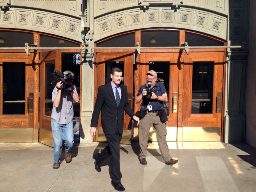 In this file photo, former Washington state Auditor Troy Kelley leaves the U.S. District Courthouse in Tacoma. On Friday, Kelley won a motion to remain free on bail pending his appeal to the Ninth Circuit Court of Appeals.