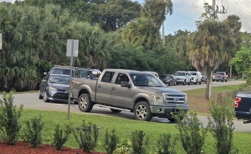 A evening food distribution in Immokalee recently let those who might not be able to attend a daytime event get access to needed food staples and supplies.