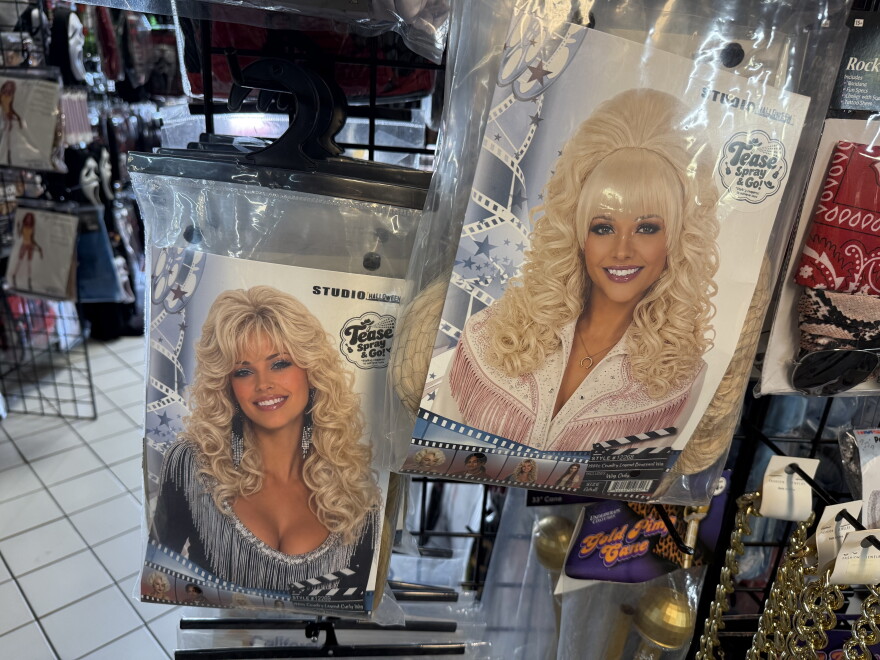 Deepack "D." Nachnani, owner of Harygul's Halloween Superstore, said Dolly Parton wigs — or "1980s Country Legend Bouffant" wigs, according to the packaging — have been top sellers this season.