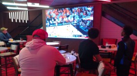 At The Red Mile on Easter Sunday afternoon, folks betting on Elite 8 basketball games didn't seem too upset over the absence of the school less than a mile away.
