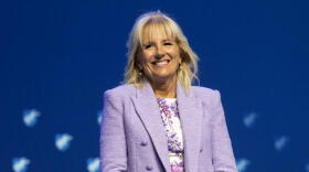 FILE - First lady Jill Biden smiles as she is introduced before speaking during the American Federation of Teachers convention, July 15, 2022, in Boston. Jill Biden and Education Secretary Miguel Cardona are kicking off a summer learning tour this week with stops in Connecticut, Georgia and Michigan over two days.