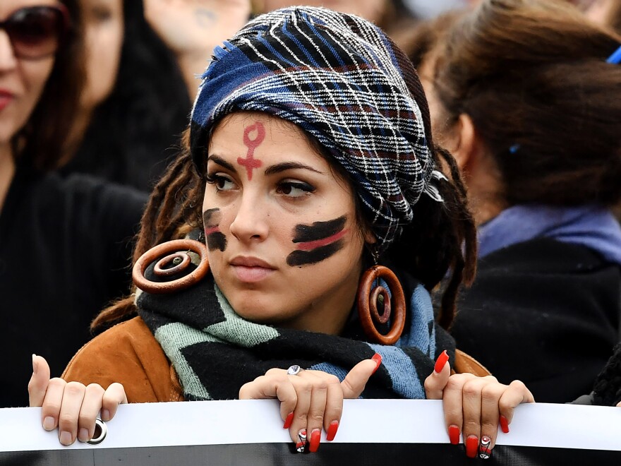 A woman takes part in a demonstration to mark the International Day for the Elimination of Violence Against Women in Rome in November 2017.