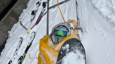Ski patrollers carry Nico Heins down the Snowmass Ski Area in a toboggan after he sustained a leg injury in February 2026. Heins had to be rescued off the mountain after he collided with a skier and broke his leg.