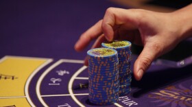 A croupier counts the chips at a baccarat gaming table inside a casino during the opening day of Sheraton Macao Hotel at the Sands Cotai Central in Macau Thursday, Sept. 20, 2012. The former Portuguese colony of Macau is still the only place where Chinese citizens can legally gamble in their own country.