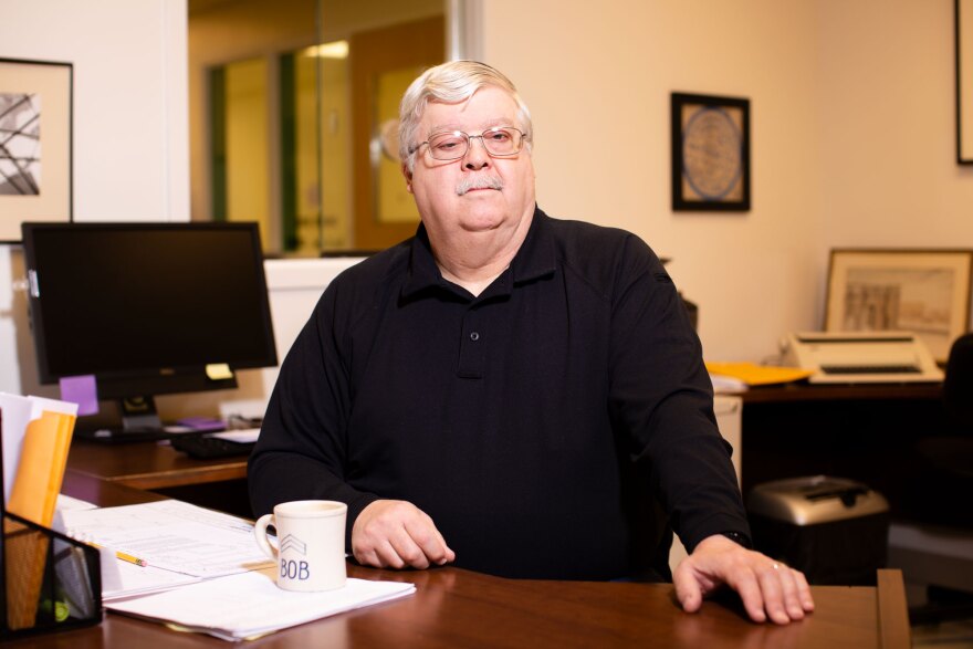 Bob Kegel, coroner in Grays Harbor County, sits in his office inside the local hospital in Aberdeen.