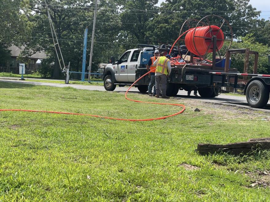 Workers at Lake Region Electric Cooperative installs fiber in Hulbert, Oklahoma.