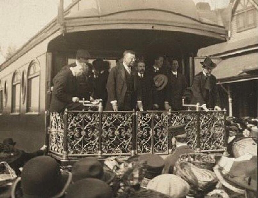 Theodore Roosevelt campaigns from the back of a train in 1905.
