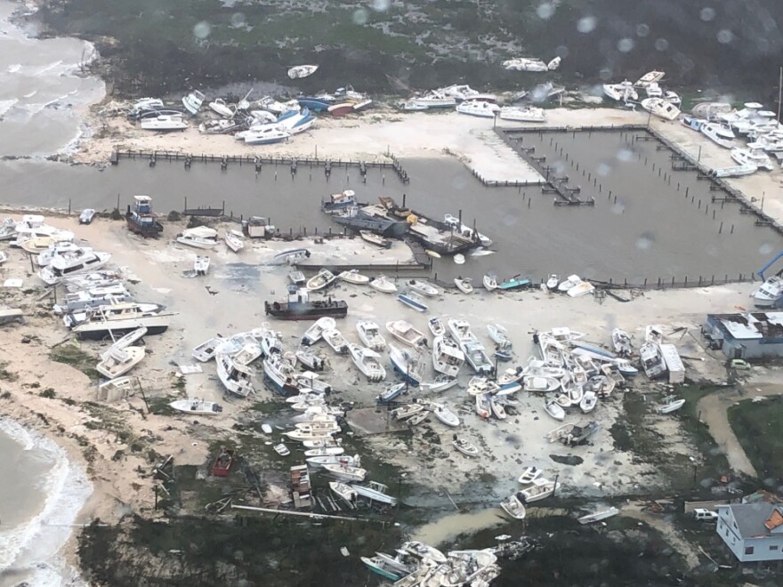 Coast Guard Air Station Clearwater forward-deployed four MH-60 Jayhawk helicopter crews in support of search and rescue and humanitarian aid in the Bahamas, Sept. 2, 2019. (U.S. Coast Guard photo courtesy of Coast Guard Air Station Clearwater)