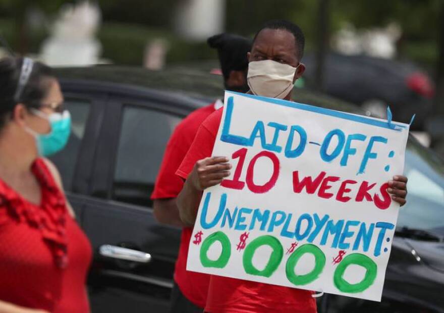 In May, Joseph Louis joins others in a protest asking the state of Florida to fix its unemployment system.