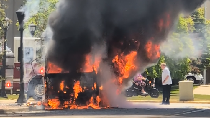 A mobile billboard truck is engulfed in flames while parked in downtown Bay City on Thursday, June 4, 2026. It was the second truck of its kind to catch fire in a period of six weeks.