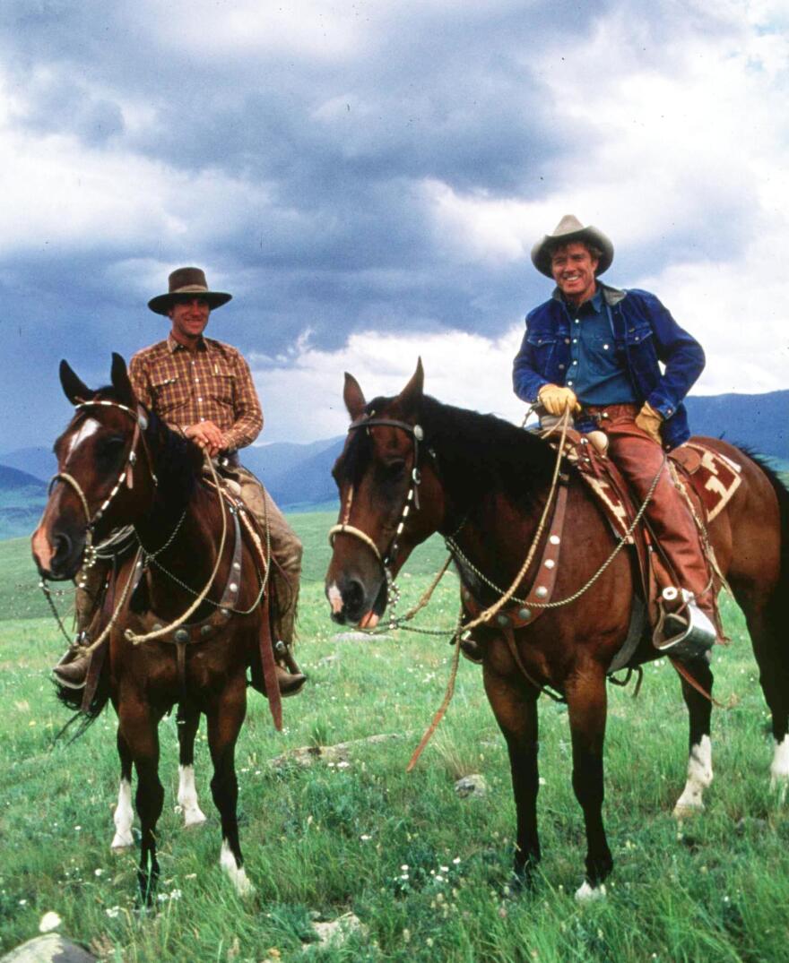 Redford (right) directed and starred in <em>The Horse Whisperer</em> in 1998. He's pictured above with real-life horse whisperer Buck Brannaman.