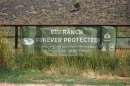 A sign celebrates Summit County's acquisition of the 8,800-acre 910 Ranch, seen here on Aug. 5, 2026.