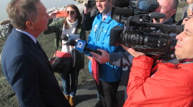 Gov. John Kasich talking to journalists after opening the newly reinforced dam at Buckeye Lake. 