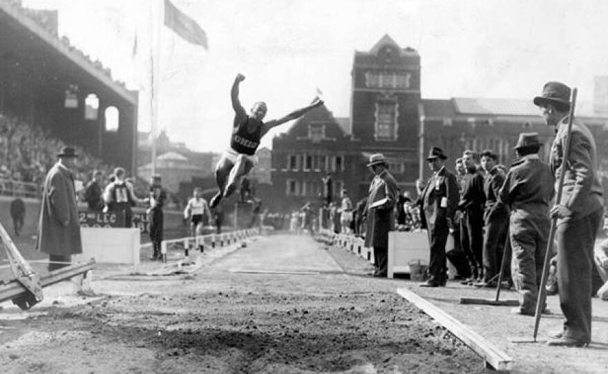 Jesse Owens competes in the broad jump as an Ohio State student.