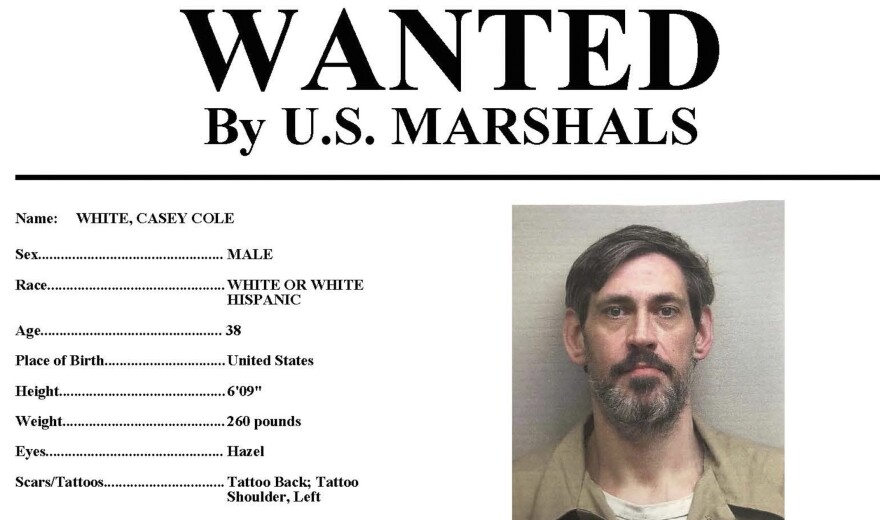 This image provided by the U.S. Marshals Service on Sunday, May 1, 2022 shows part of a wanted poster for Casey Cole White. On Sunday, the U.S. Marshals announced it is offering up to $10,000 for information about escaped inmate Casey Cole White, 38, and a “missing and endangered” correctional officer, Vicky White, 56, who disappeared Friday after they left the Lauderdale County Detention Center in Florence, Ala. (U.S. Marshals Service via AP)