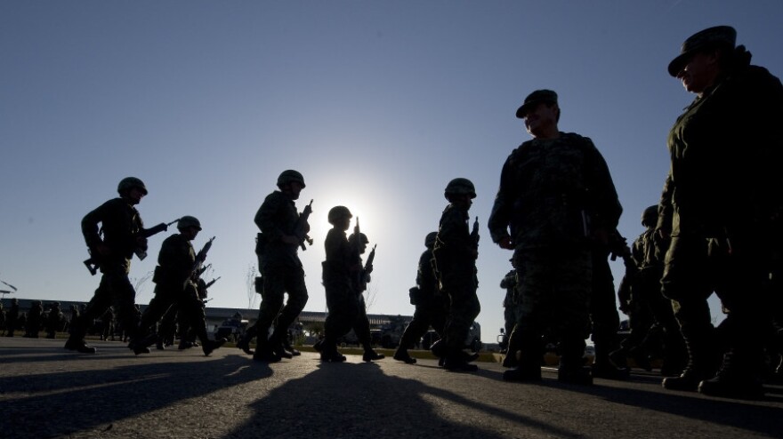 Mexican soldiers at a ceremony in Ciudad Mier earlier this month. The military and other branches of the security forces have now battled the cartels for five years. While most of the violence is blamed on the cartels, human rights groups say the security forces have also been linked to abuses.