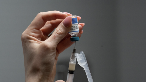 FILE - Lauren Ellenburg, a nurse, prepares a combination measles, mumps and rubella vaccine for a patient at Tiger Pediatrics in Easley, S.C., March 17, 2026.