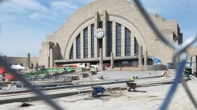 Construction crews work on reinstalling the fountain in front of Cincinnati's Union Terminal on Aug. 24, 2018.