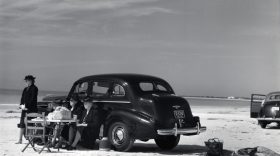Marion Post Wolcott, Winter Visitors from Nearby Trailer Park, Picnicking Beside Car on Beach, Near Sarasota, Florida, 1941.