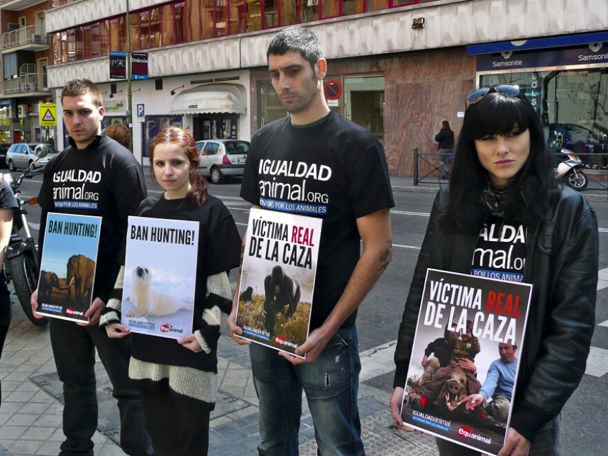 Members of the animal-rights group Igualdad Animal protest outside the Madrid hospital where Spanish King Juan Carlos was recovering after hip surgery this week. The king, who went elephant hunting in Africa, is the honorary president of the World Wildlife Fund in Spain.