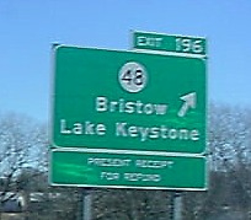 A sign marks the Bristow exit on the Turner Turnpkike.